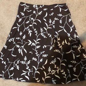 Brown skirt with white embroidered flowers